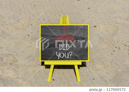 I voted. Did you symbol. Concept words I voted. Did you on beautiful black chalk blackboard. Beautiful sand beach background. Business I voted. Did you concept. Copy space. 117000572