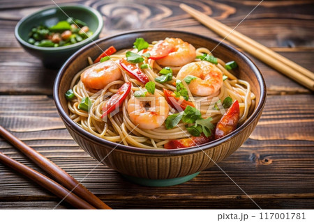Spicy stir fried noodle with shrimps and green onion in ceramic bowl on wooden background. Ai generated 117001781