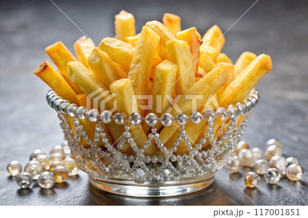 French fries in bowl with gems and crystals. Luxury fast food concept. French fries crown. Ai generated 117001851