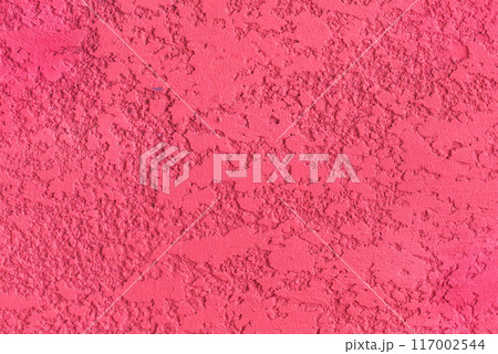 Pink paint texture plaster wall rough stucco background solid abstract pattern 117002544