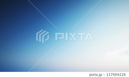 Electric blue sky meets white horizon in a blurred landscape 117004226