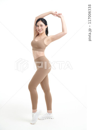 Beautiful young asian sport woman with sportswear ready for exercise on white background, Advertising sportswear and yoga wear, Healthy lifestyle, sport. 117006338