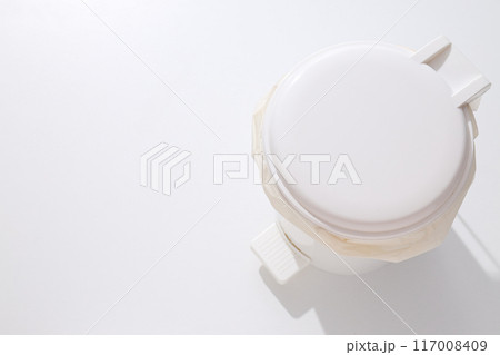 Trash can with bag on white background, space for text 117008409