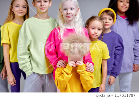 upset unhappy little girl crying wiping her eyes upset unhappy little girl crying wiping her eyes 117011787