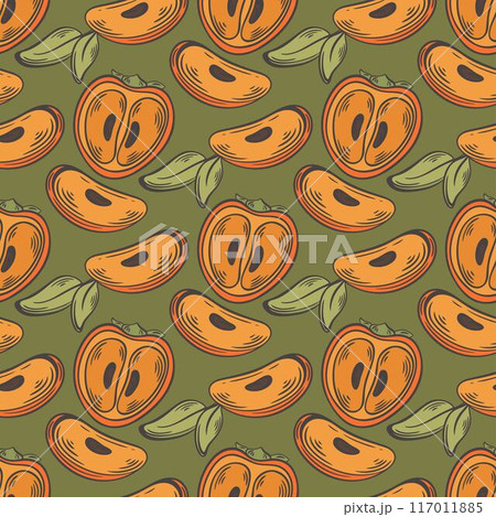 Halves of ripe persimmon on green background 117011885