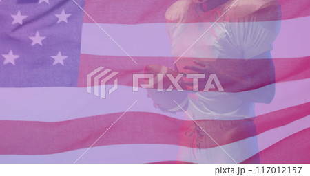 Image of african american american football player with ball and flag of usa 117012157