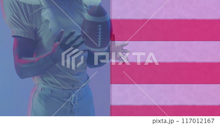 Image of african american american football player with ball and flag of usa 117012167