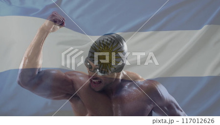 Image of flag of argentina over caucasian male swimmer Image of flag of argentina over caucasian male swimmer 117012626