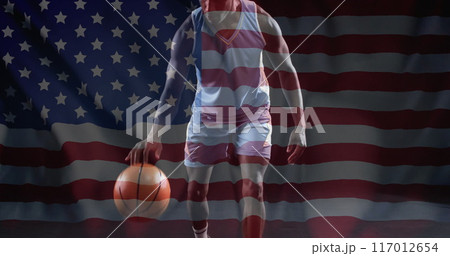 Image of flag of usa over african american male basketball player 117012654
