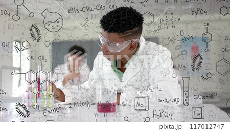 Image of scientific data processing over diverse students in laboratory 117012747