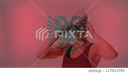 Image of flag of albania over caucasian female swimmer Image of flag of albania over caucasian female swimmer 117012765