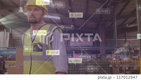 Social media interaction icons image over worker in industrial warehouse 117012947