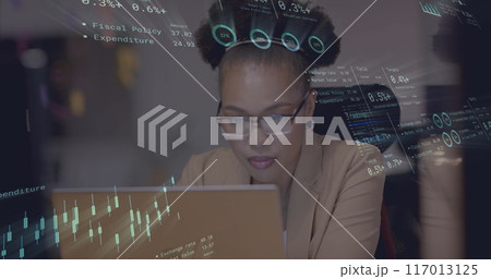 Image of financial data processing over african american businesswoman in office 117013125