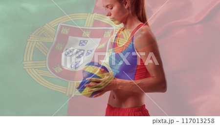 Image of flag of portugal over caucasian female volleyball player 117013258