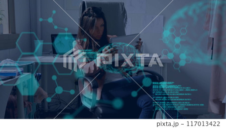 Image of human brains and digital data processing over caucasian woman using tablet Image of human brains and digital data processing over caucasian woman using tablet 117013422