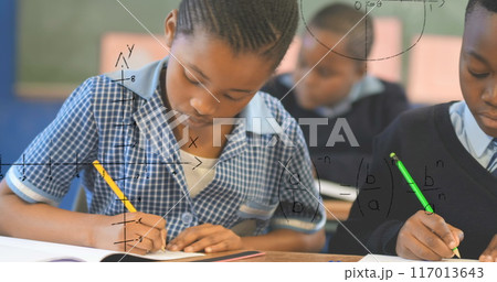 Image of math formulas over african american pupils learning at school Image of math formulas over african american pupils learning at school 117013643