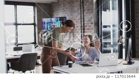 Image of digital icons with connections over diverse business people in office 117013644