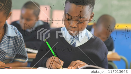 Image of math formulas over african american pupils learning at school Image of math formulas over african american pupils learning at school 117013648