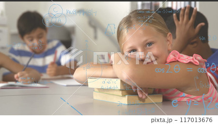 Image of math formulas over happy caucasian girl with book at school 117013676