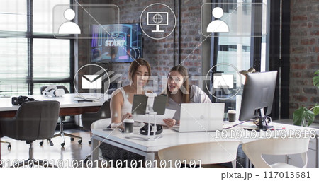 Image of digital icons and data processing over diverse business people in office 117013681