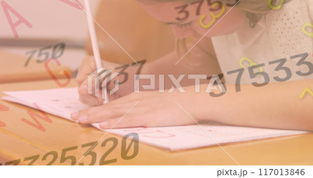 Image of multiple changing numbers and alphabets over caucasian girl studying in class at school Image of multiple changing numbers and alphabets over caucasian girl studying in class at school 117013846