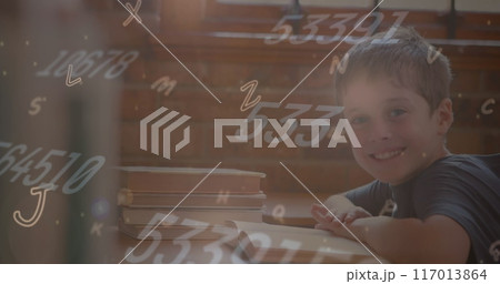 Image of multiple alphabets and numbers floating over caucasian boy smiling in class at school Image of multiple alphabets and numbers floating over caucasian boy smiling in class at school 117013864