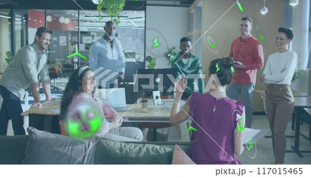 Image of ecology icons over diverse colleagues having meeting in office 117015465