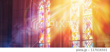 A window with a sun shining through in church A window with a sun shining through in church 117016501