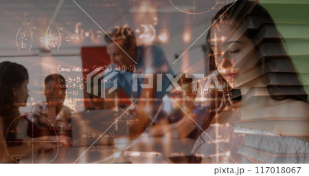 Image of math formulas moving over biracial girl using smartphone at school 117018067