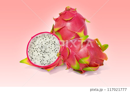 Dragon fruit, red-green peel fruit isolated on a light red background 117021777
