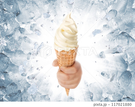 Soft ice cream in hand on background of broken ice 117021880
