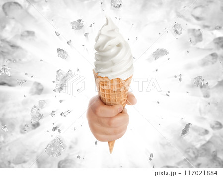 Soft ice cream in hand on background of broken ice 117021884