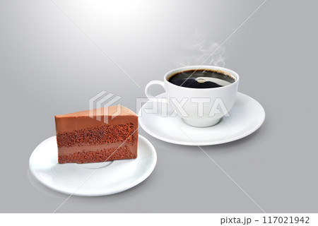 Coffee mug, chocolate cake in plate isolated on a gray background 117021942