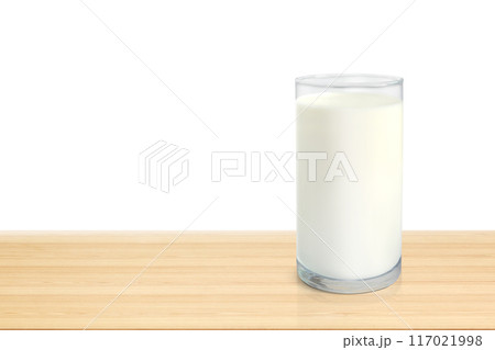 Milk in glass on wooden table isolated on white background Milk in glass on wooden table isolated on white background 117021998