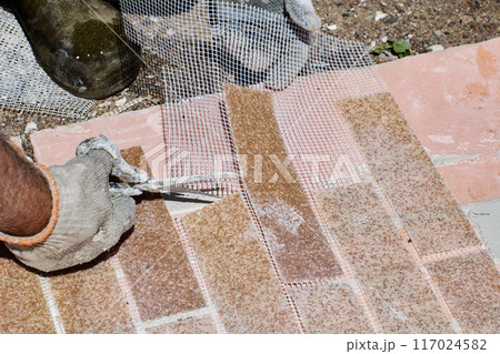 Thin flexible panel with imitation brickwork is made of acrylic marble chips. Thin flexible panel with imitation brickwork is made of acrylic marble chips. 117024582