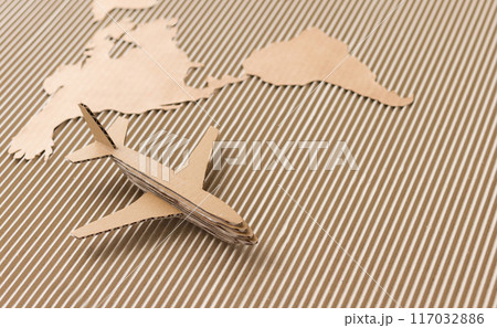 Airplane and world map made of cardboard Airplane and world map made of cardboard 117032886