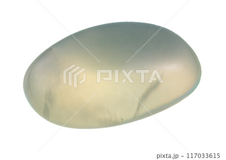 natural green prehnite gem on the white background 117033615
