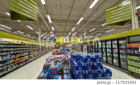 Display nature food corridor at Superstore; interior of supermarket full of grocery items 117035091