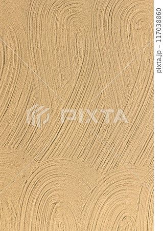 茶色の塗料を鏝で塗り伸ばした緩やかな模様、背景素材 茶色の塗料を鏝で塗り伸ばした緩やかな模様、背景素材 117038860