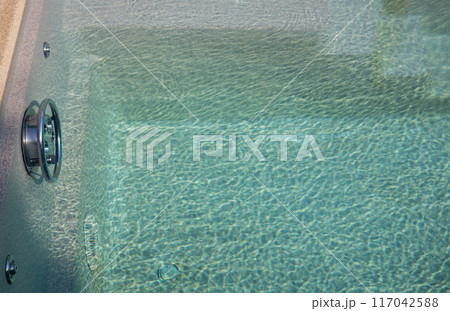 clear water in swimming pool 117042588