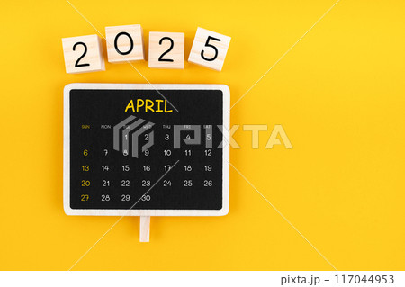 Calendar for April 2025 in black chalkboard with copy space. 117044953