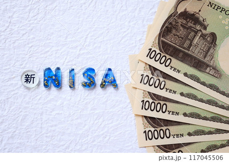 レジン製の新NISAの文字と新一万円札 117045506