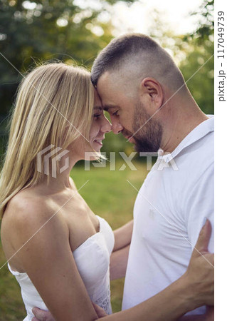 a 30-year-old couple in love in the garden 117049739