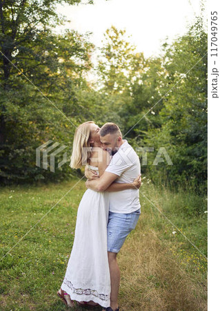 a 30-year-old couple in love in the garden a 30-year-old couple in love in the garden 117049765