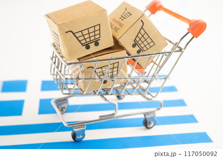 Box with shopping online cart logo and Greece flag, Import Export Shopping online or commerce finance delivery service store product shipping, trade, supplier. Box with shopping online cart logo and Greece flag, Import Export Shopping online or commerce finance delivery service store product shipping, trade, supplier. 117050092