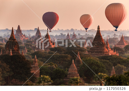 Balloon over plain of Bagan in misty morning, Myanmar 117050326