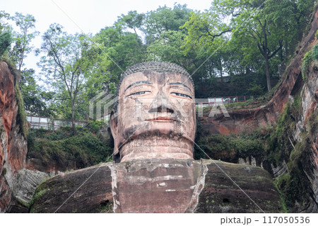 Closeup of Leshan GIant Buddha is a 71-metre tall stone statue, and popular tourism attraction in Sichuan province, China 117050536