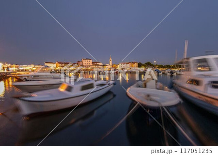 Picture over the harbor of Fazana in Istria in the evening during sunset 117051235