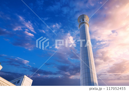 white minaret of modern new Islamic Masjid Minor Mosque in Tashkent in Uzbekistan on background of beautiful sky white minaret of modern new Islamic Masjid Minor Mosque in Tashkent in Uzbekistan on background of beautiful sky 117052455