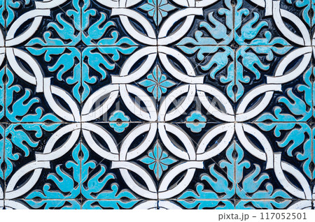 tile mosaic with oriental Arabic Uzbek pattern decorated with blue and white floral ornament tile mosaic with oriental Arabic Uzbek pattern decorated with blue and white floral ornament 117052501